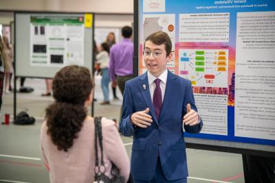 A student presents their research at the 2023 Celebration of Scholars.